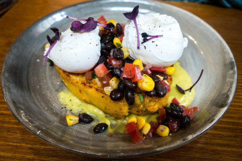 Black bean corn cake with poached eggs at Seven Seeds
