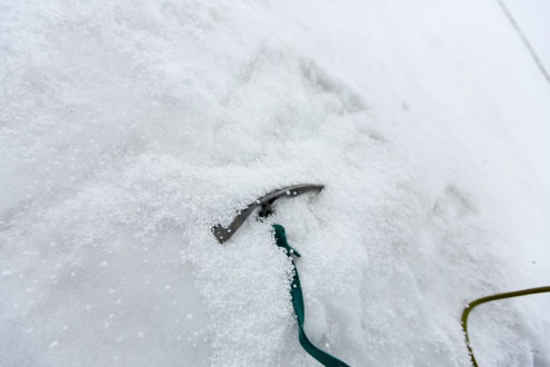 Dippin' dot hail covering our ice axe anchors
