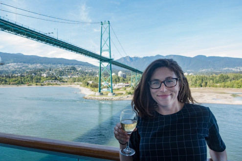 Cruising under the Lions Gate Bridge with a glass of bubbly