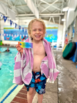 Tycho earned his first swim ribbon!!